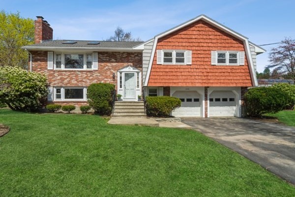 240 Worthen Road East Lexington, MA 02421 - Photo 1 of 33 front view of a house with a yard