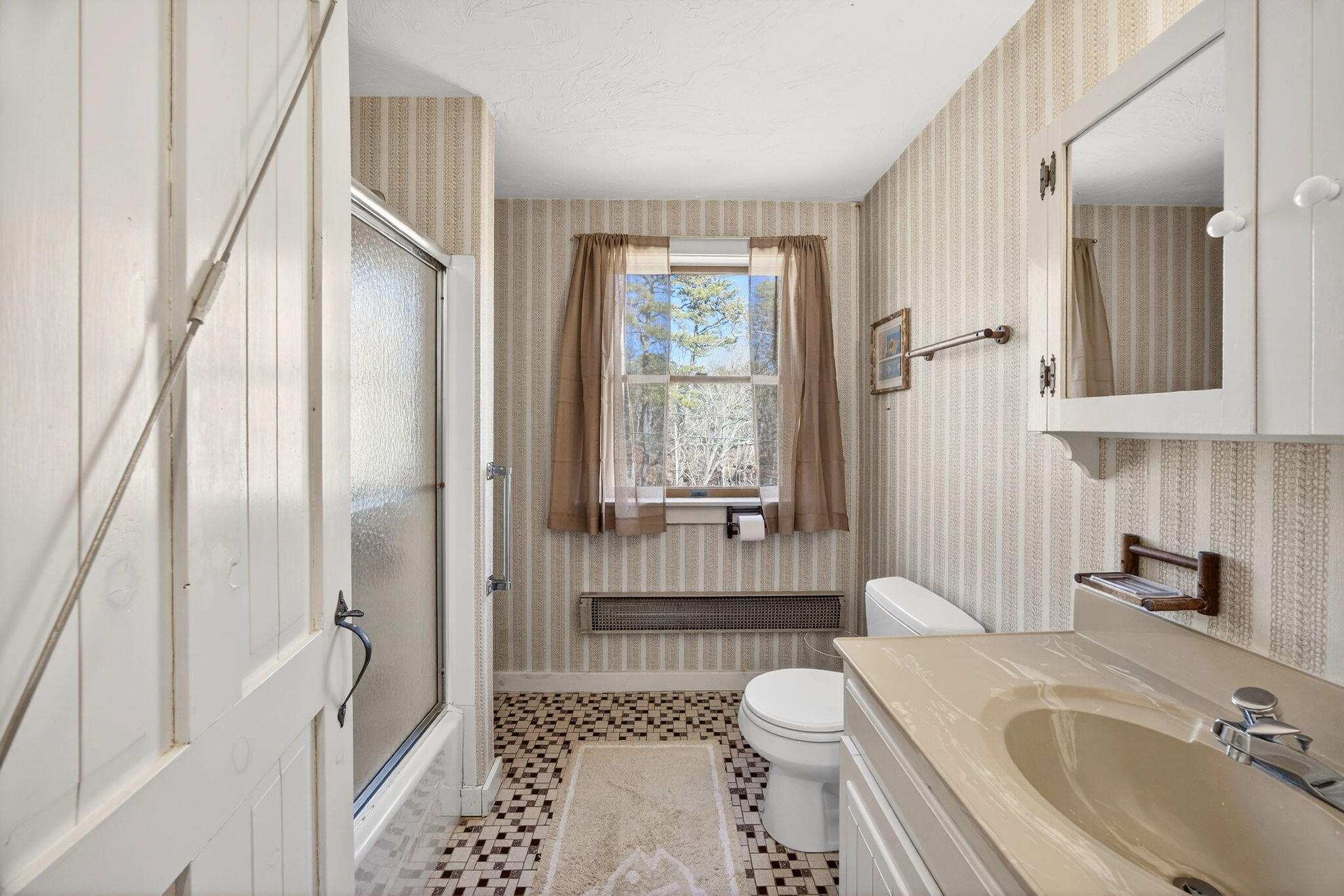 165 Cottontail Road Wellfleet, MA 02667 - Photo 18 of 46 a bathroom with a sink toilet and shower