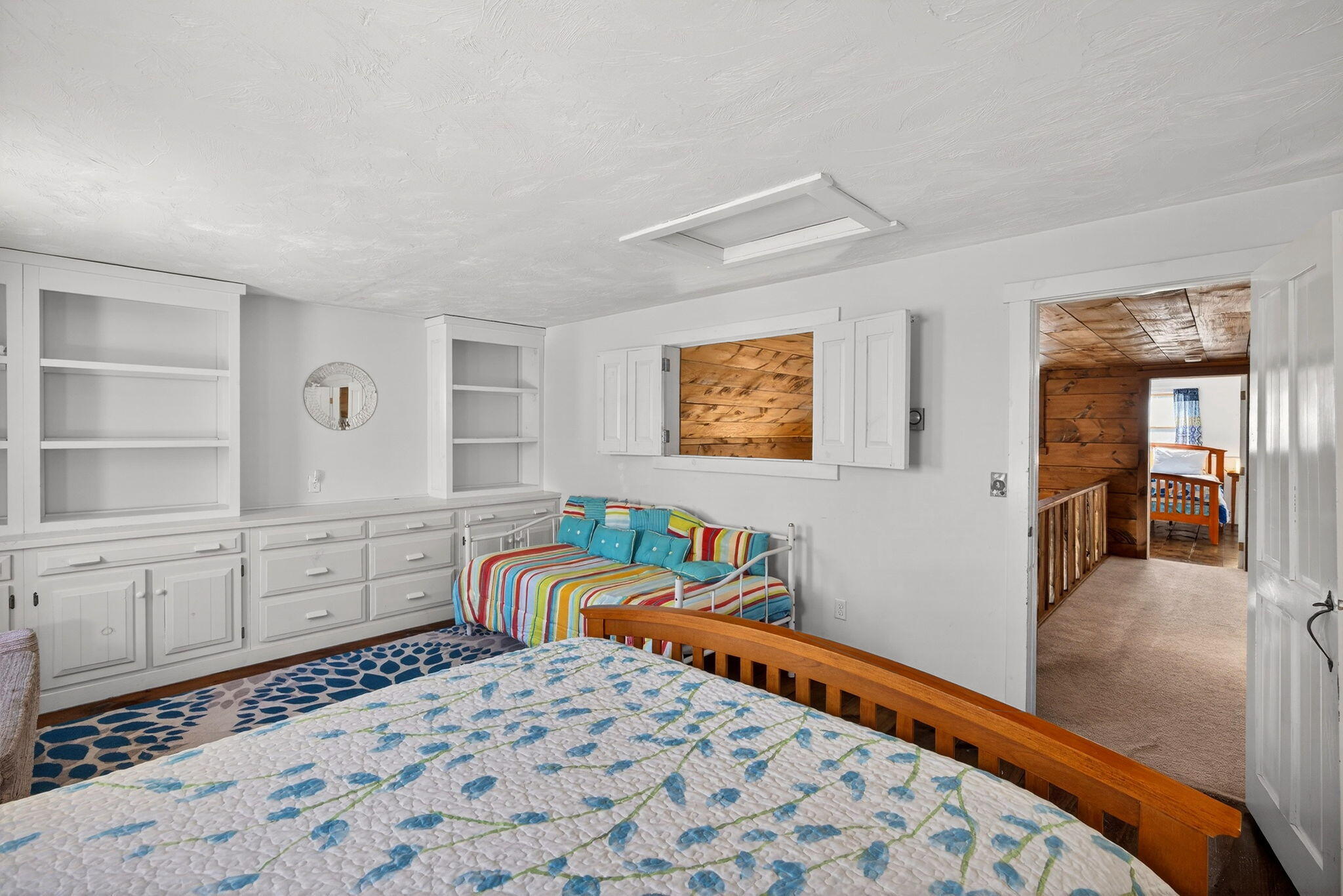 165 Cottontail Road Wellfleet, MA 02667 - Photo 23 of 46 a bed room with a bed and cabinets