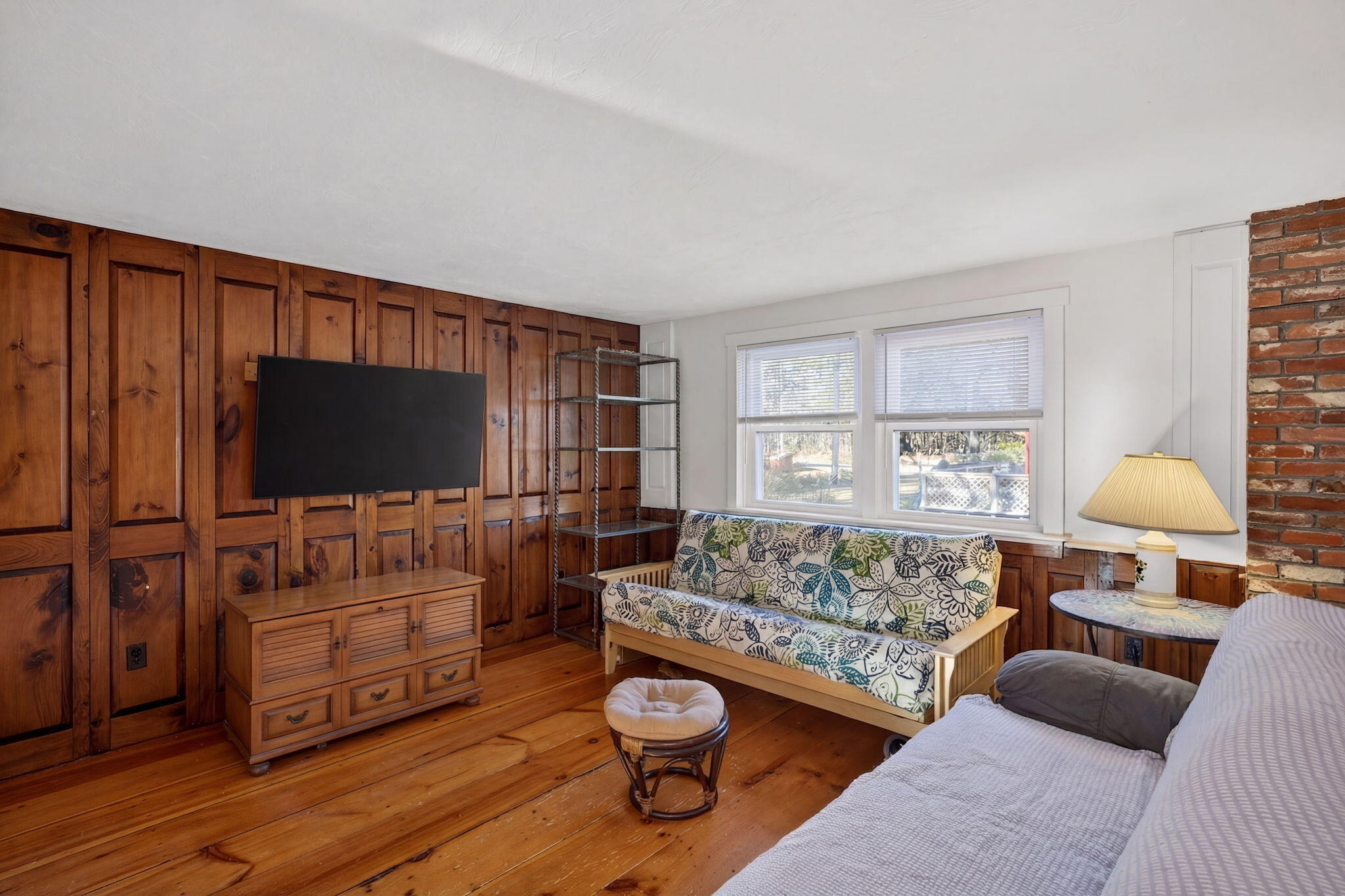 165 Cottontail Road Wellfleet, MA 02667 - Photo 34 of 46 a living room with furniture and a flat screen tv