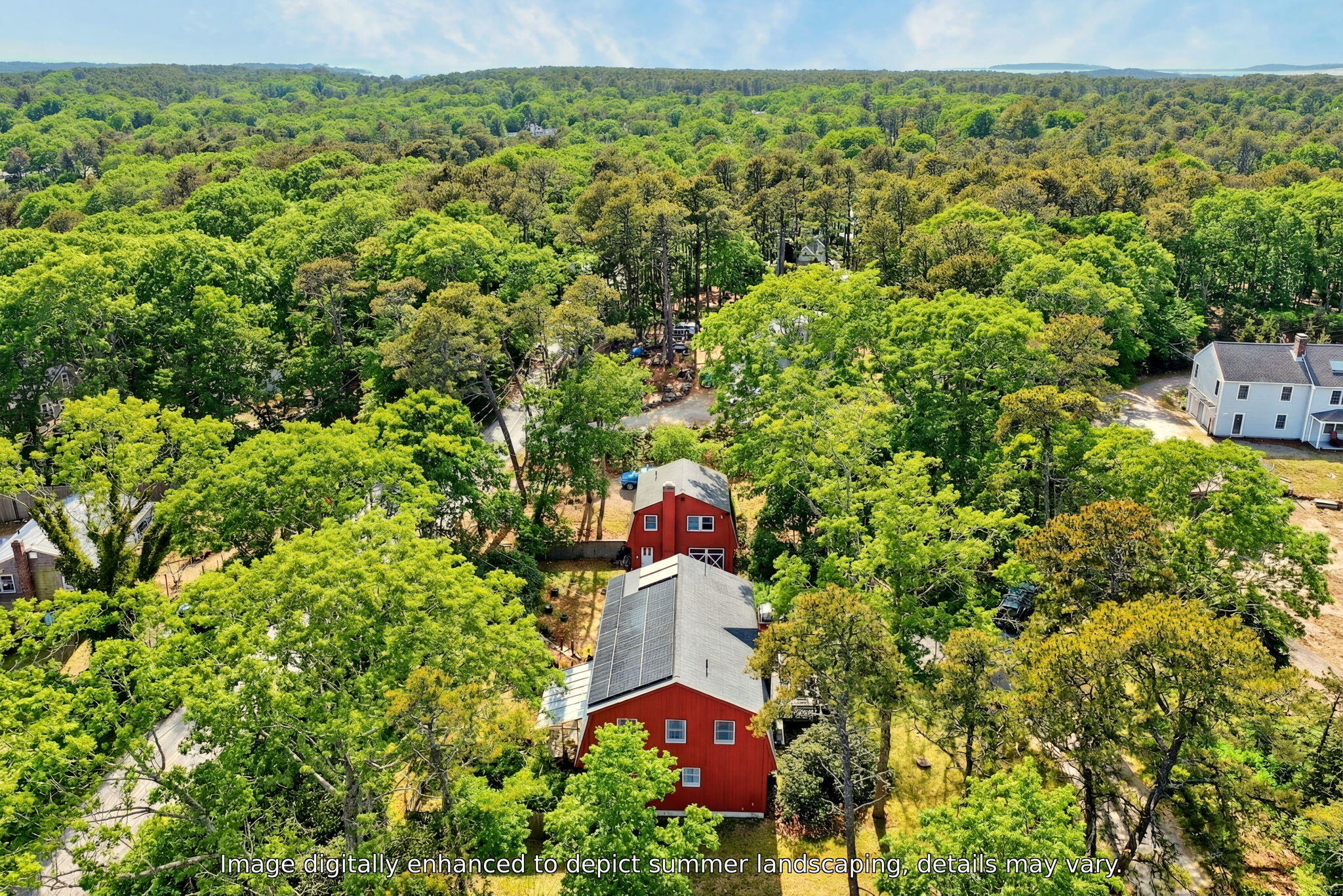 165 Cottontail Road Wellfleet, MA 02667 - Photo 39 of 46 a aerial view of a house with a yard and large trees