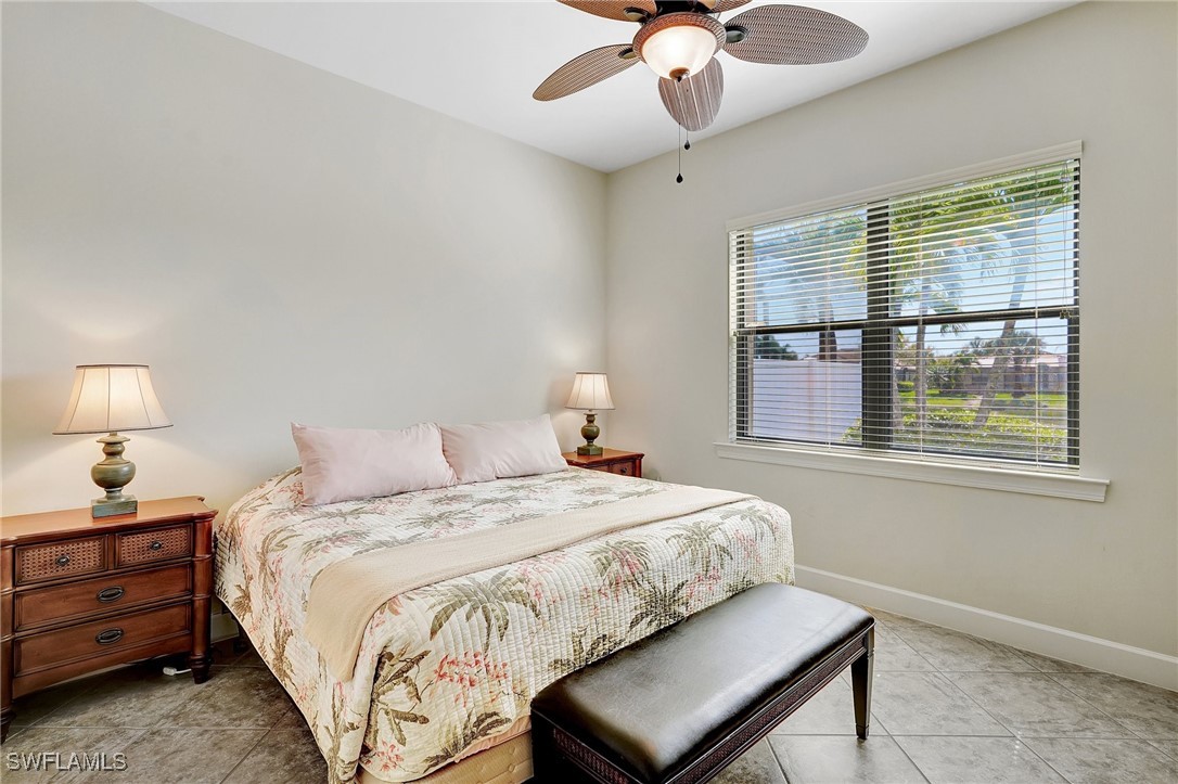10879 Rutherford Road Fort Myers, FL 33913 - Photo 12 of 36 a bedroom with a bed and a window