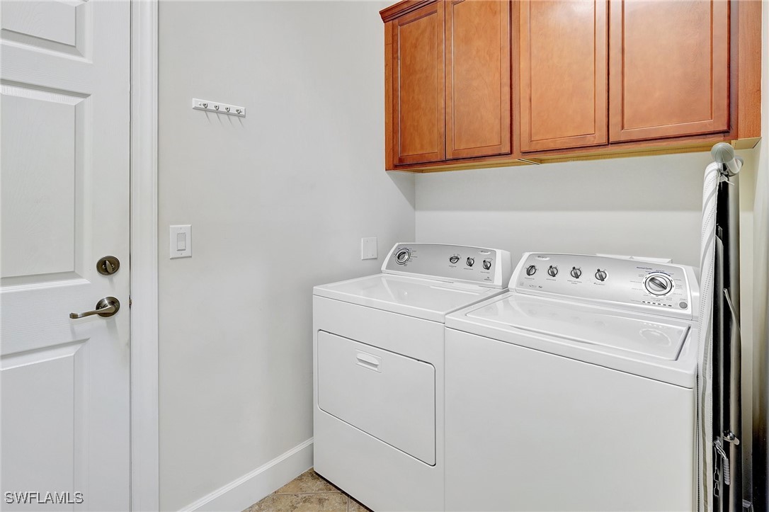 10879 Rutherford Road Fort Myers, FL 33913 - Photo 19 of 36 a utility room with dryer and washer