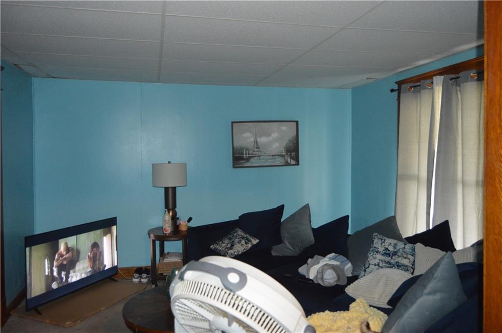 606 Chestnut Street New Castle, PA 16101 - Photo 3 of 12 a living room with furniture and a window