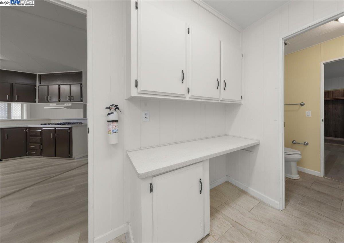 3263 Vineyard Avenue, Unit 44 Pleasanton, CA 94566 - Photo 17 of 31 a kitchen with a sink and cabinets