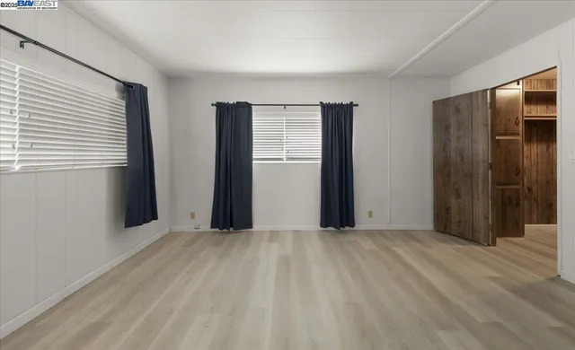 a bathroom with a double vanity sink toilet and shower