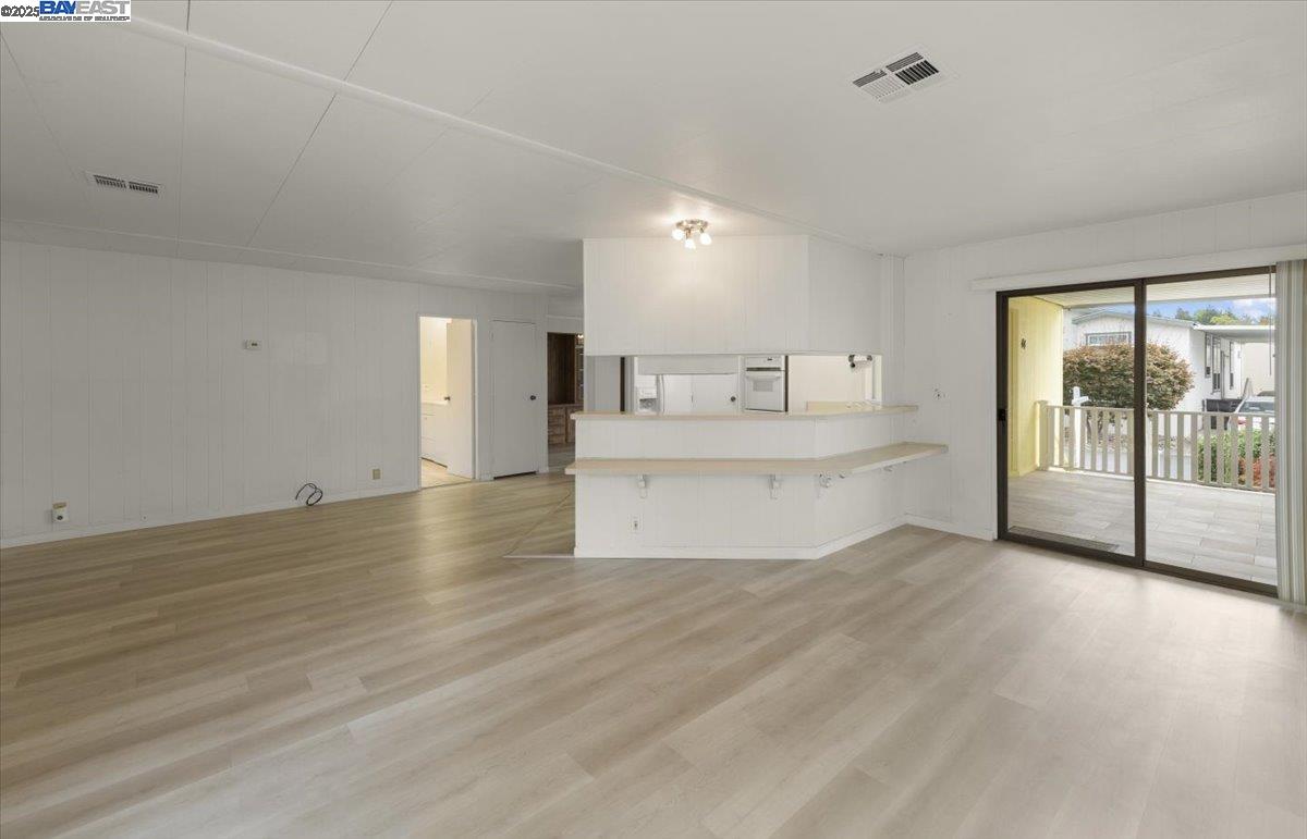 3263 Vineyard Avenue, Unit 44 Pleasanton, CA 94566 - Photo 10 of 31 a view of a kitchen with a sink and a window