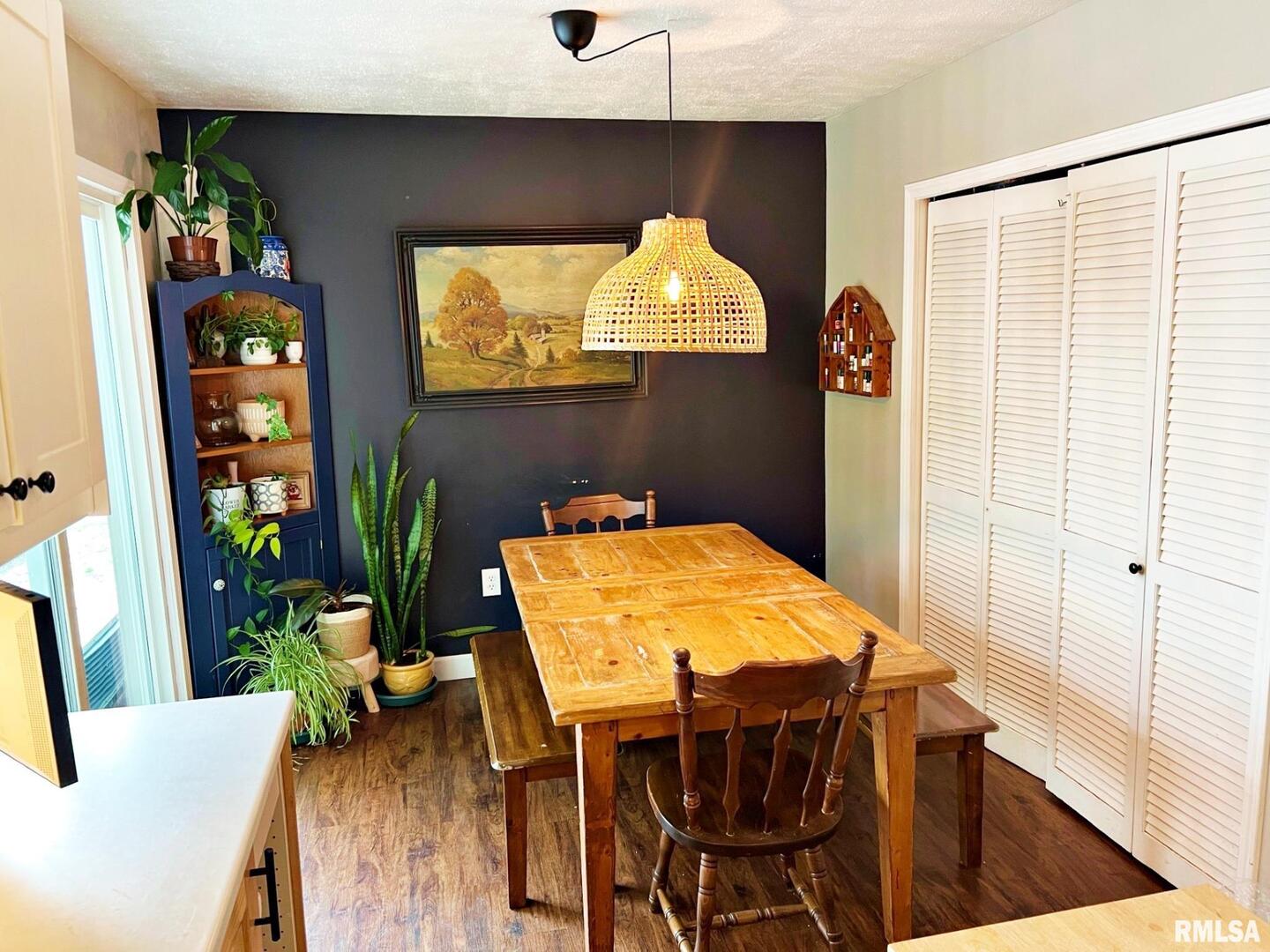803 Butler Street Metropolis, IL 62960 - Photo 7 of 14 a view of a dining room with furniture and wooden floor