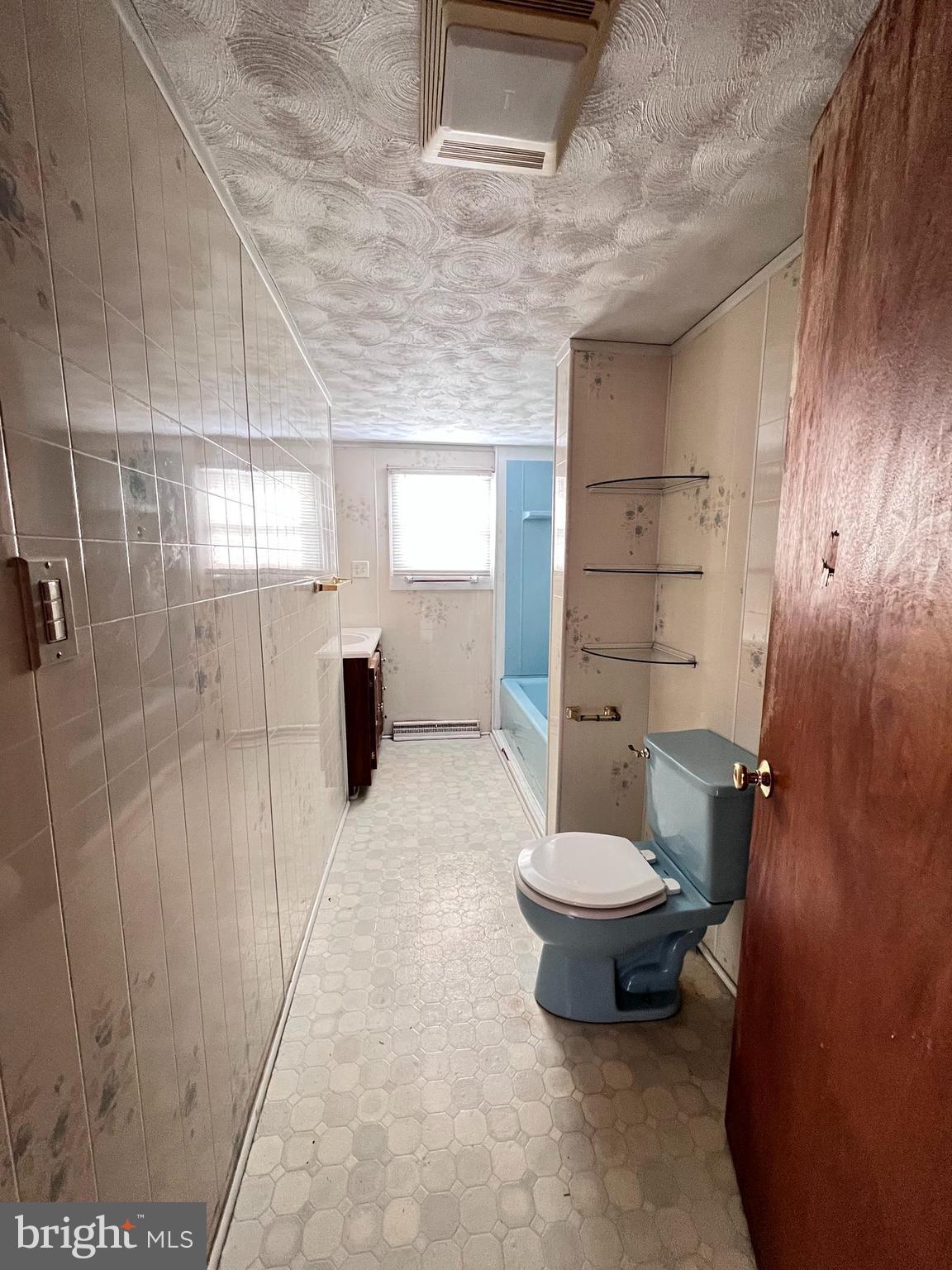 1857 Westside Lane Spring Grove, PA 17362 - Photo 19 of 35 a bathroom with a toilet and a shower