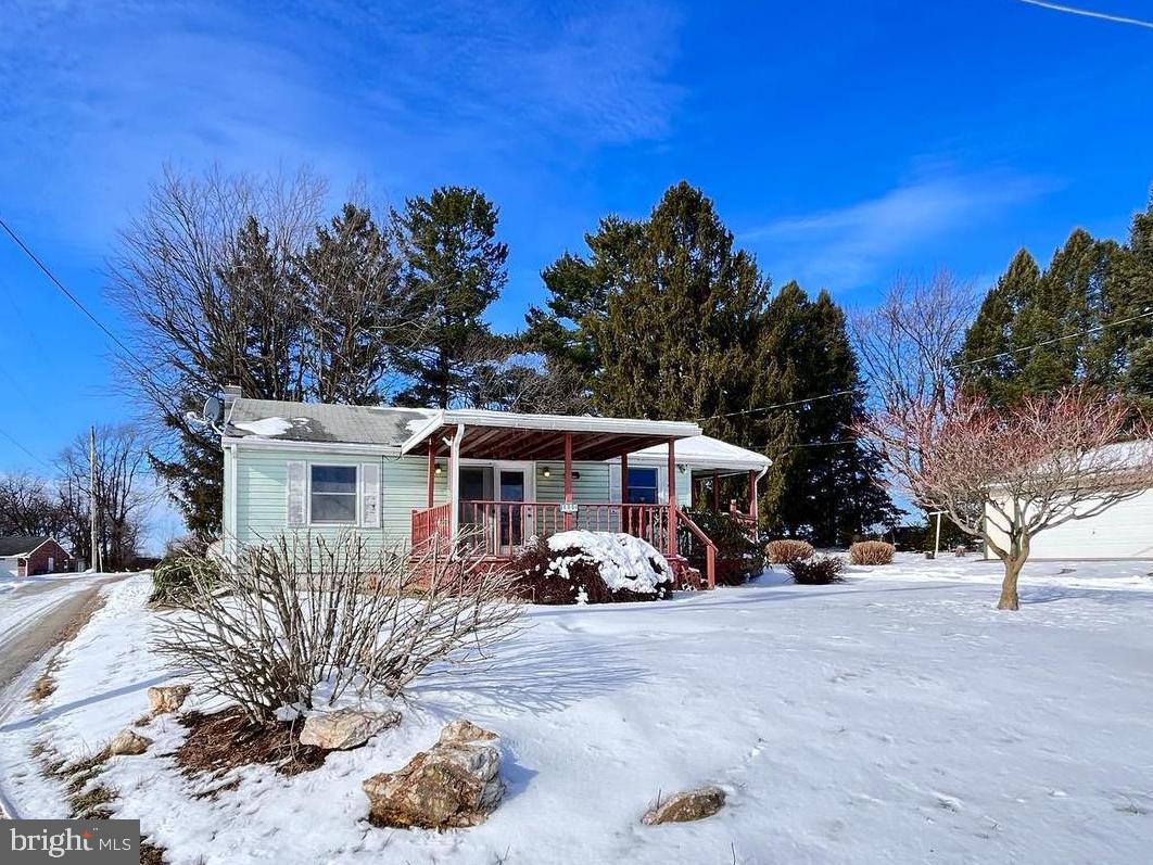 1857 Westside Lane Spring Grove, PA 17362 - Photo 2 of 35 a view of a house with a yard covered in snow