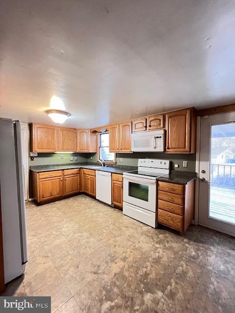 1857 Westside Lane Spring Grove, PA 17362 - Photo 8 of 35 a large kitchen with stainless steel appliances and a refrigerator