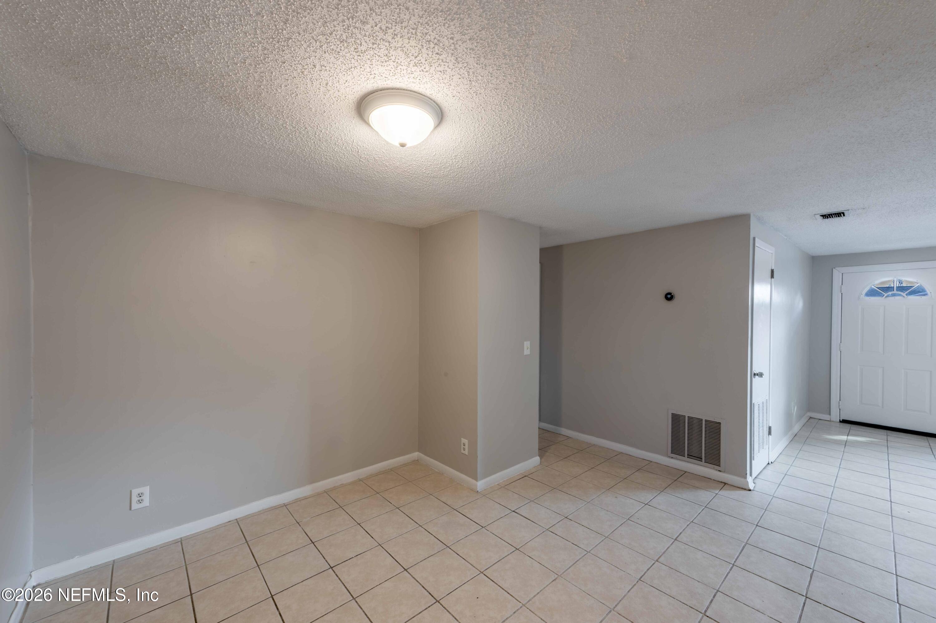 11605 Bayou Road Jacksonville, FL 32246 - Photo 20 of 39 a view of an empty room