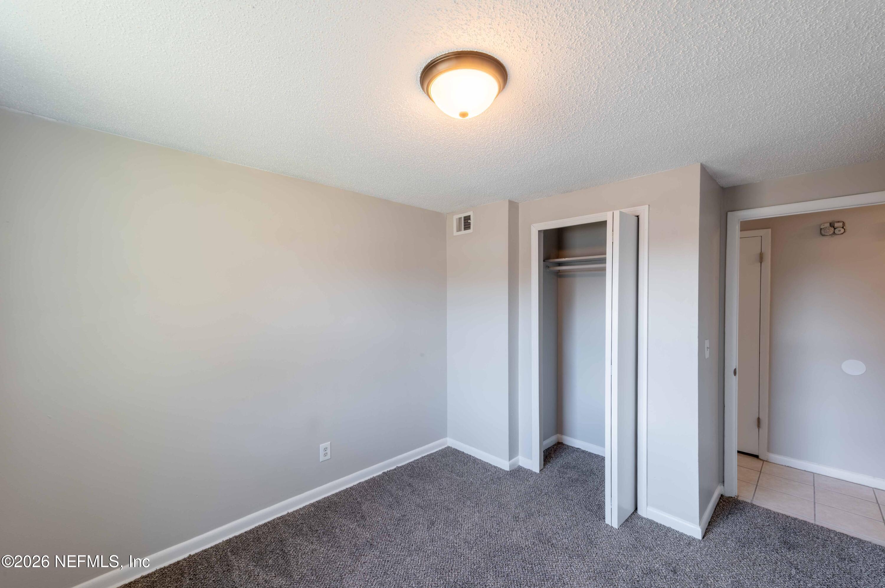 11605 Bayou Road Jacksonville, FL 32246 - Photo 31 of 39 a view of an empty room