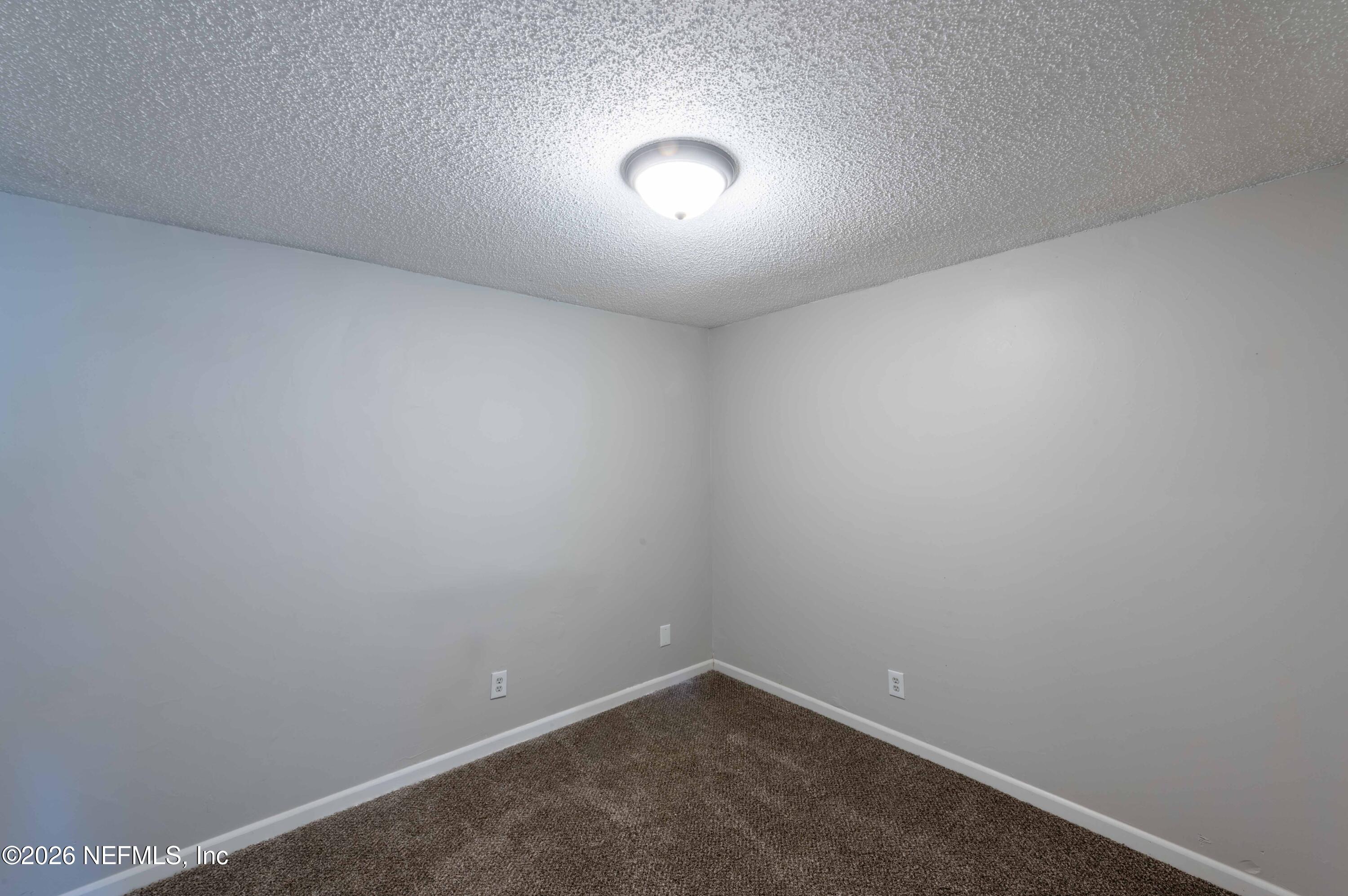 11605 Bayou Road Jacksonville, FL 32246 - Photo 34 of 39 a view of an empty room