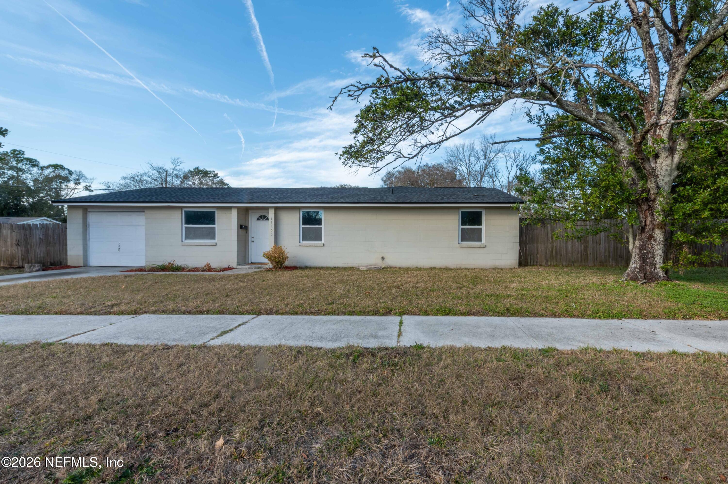 11605 Bayou Road Jacksonville, FL 32246 - Photo 7 of 39 a front view of house with yard