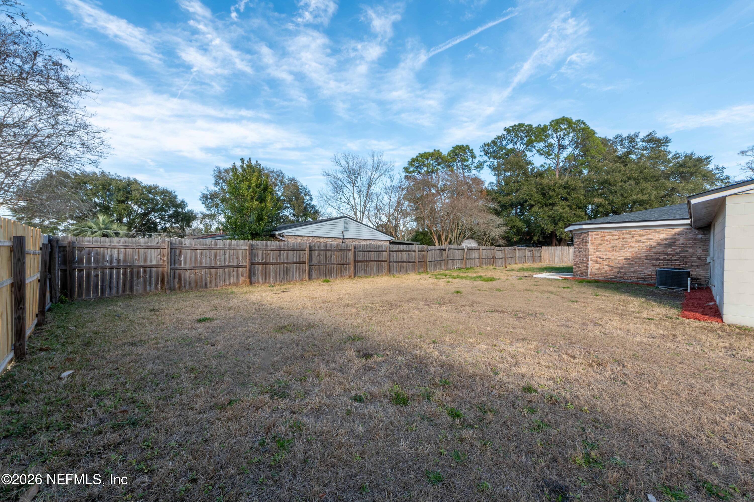 11605 Bayou Road Jacksonville, FL 32246 - Photo 9 of 39 a view of a backyard