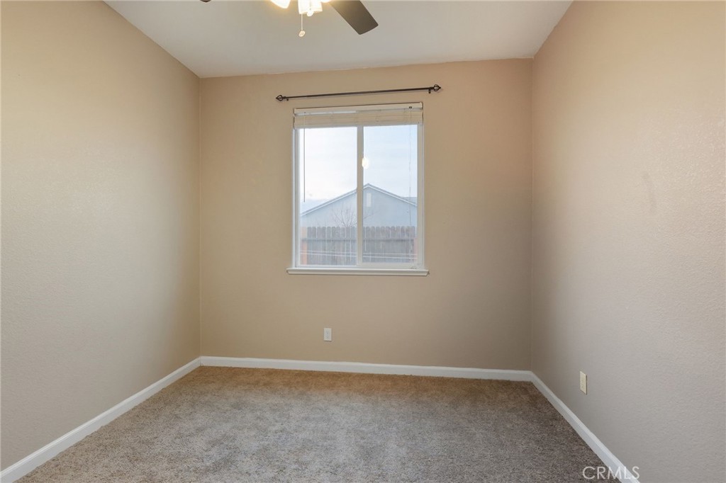 511 Glendon Court Merced, CA 95348 - Photo 15 of 37 an empty room with a window