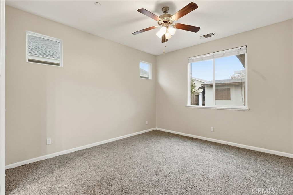 511 Glendon Court Merced, CA 95348 - Photo 16 of 37 a view of an empty room with a window