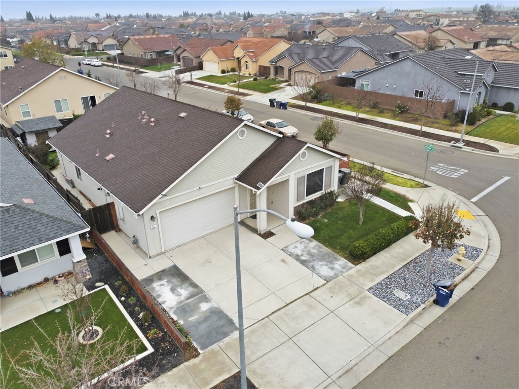 511 Glendon Court Merced, CA 95348 - Photo 6 of 37 an aerial view of a house with a ocean view