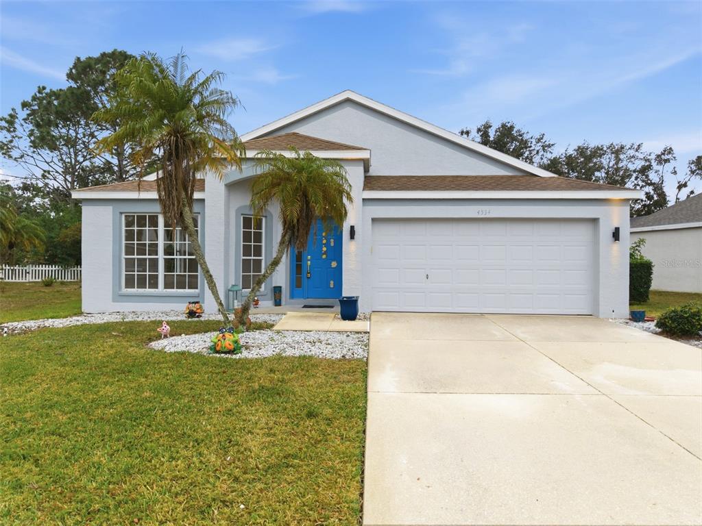4534 Cabbage Key Terrace Bradenton, FL 34203 - Photo 2 of 33 a front view of a house with garden