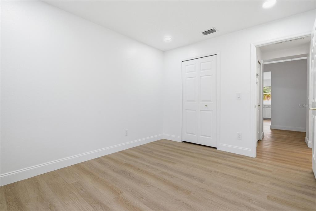 4534 Cabbage Key Terrace Bradenton, FL 34203 - Photo 24 of 33 wooden floor in an empty room
