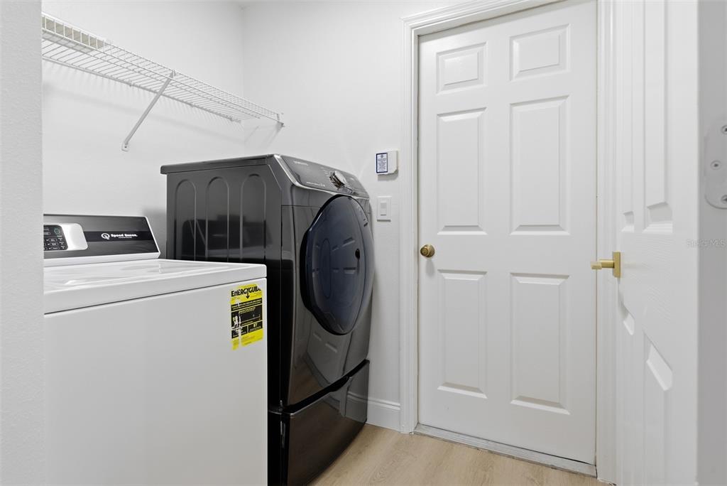 4534 Cabbage Key Terrace Bradenton, FL 34203 - Photo 25 of 33 a utility room with dryer and washer