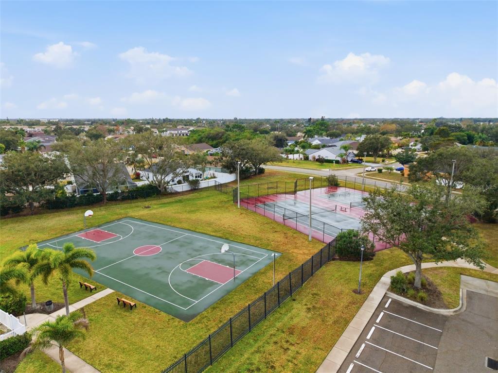 4534 Cabbage Key Terrace Bradenton, FL 34203 - Photo 30 of 33 an aerial view of a pool patio swimming pool and lake view