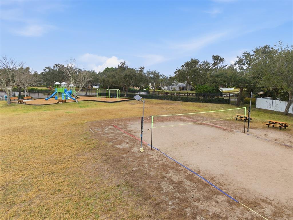 4534 Cabbage Key Terrace Bradenton, FL 34203 - Photo 33 of 33 a view of swimming pool with outdoor seating and yard in back
