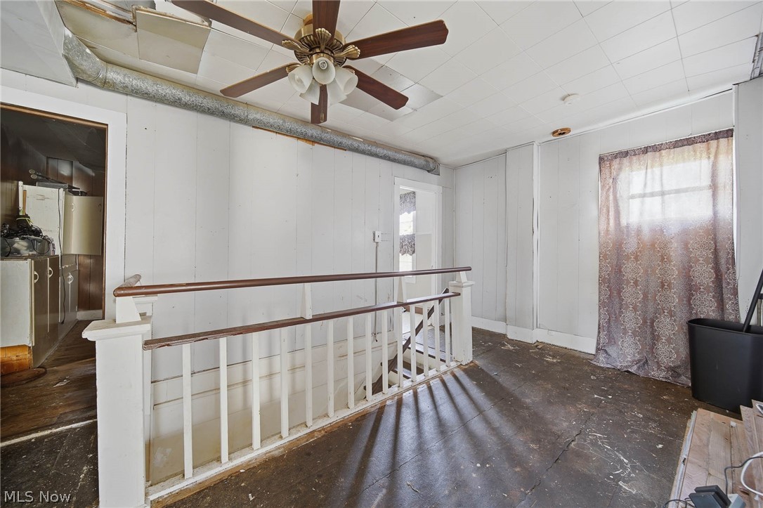 4677 Rock Spring Road Ravenna, OH 44266 - Photo 18 of 35 Unfurnished room with ceiling fan and baseboards