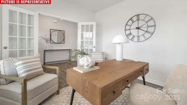 a living room with furniture a table and a mirror