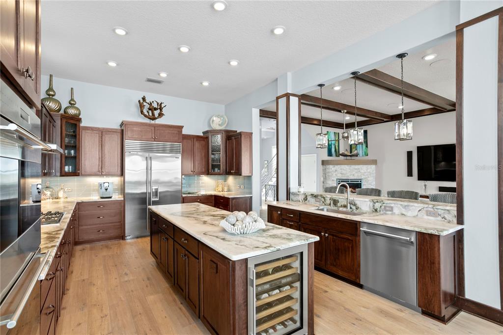 15612 Gulf Boulevard Redington Beach, FL 33708 - Photo 13 of 92 a kitchen with a stove and a refrigerator