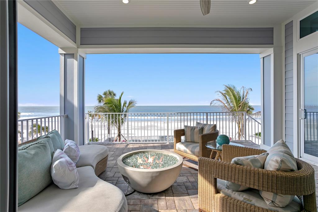15612 Gulf Boulevard Redington Beach, FL 33708 - Photo 18 of 92 a living room with furniture and a potted plant