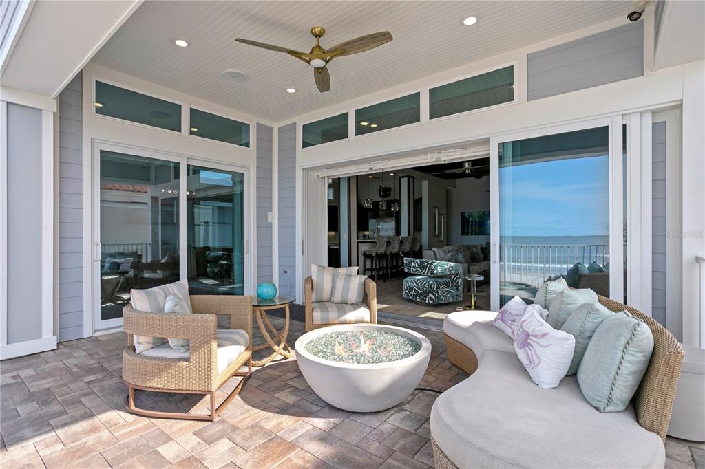 15612 Gulf Boulevard Redington Beach, FL 33708 - Photo 19 of 92 a living room with furniture and a large window