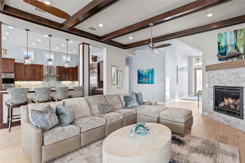 15612 Gulf Boulevard Redington Beach, FL 33708 - Photo 23 of 92 a living room with furniture and a fireplace