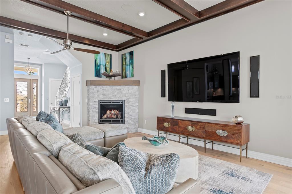 15612 Gulf Boulevard Redington Beach, FL 33708 - Photo 24 of 92 a living room with furniture and a flat screen tv