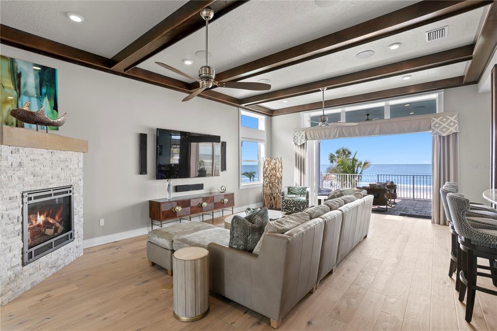15612 Gulf Boulevard Redington Beach, FL 33708 - Photo 26 of 92 a living room with furniture and a fireplace