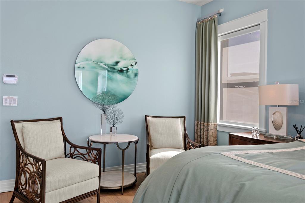 15612 Gulf Boulevard Redington Beach, FL 33708 - Photo 36 of 92 a bedroom with a bed and a mirror