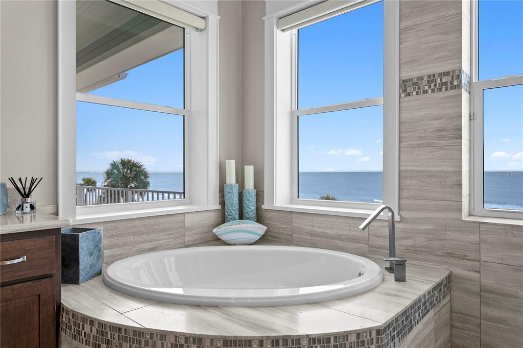 15612 Gulf Boulevard Redington Beach, FL 33708 - Photo 41 of 92 a bathroom with a sink and a window