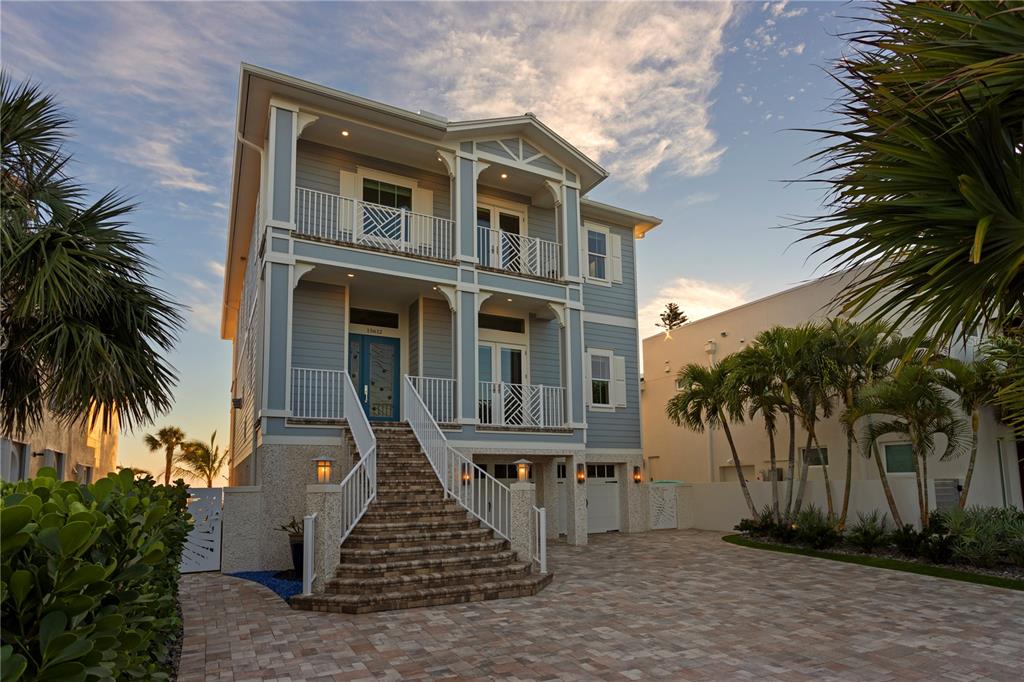15612 Gulf Boulevard Redington Beach, FL 33708 - Photo 90 of 92 front view of a house with a yard