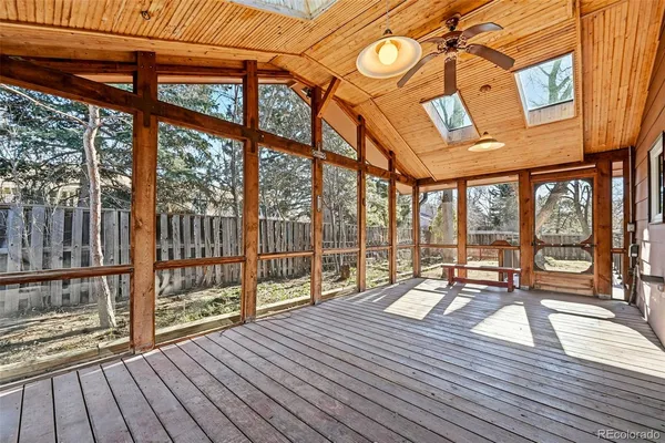 a view of a living room and wooden floor