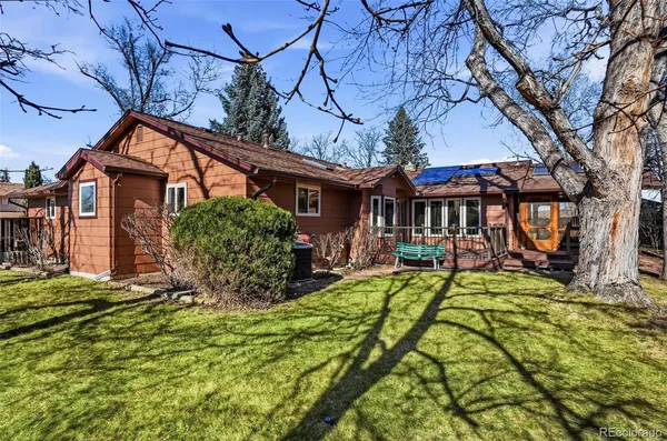 front view of a house with a big yard