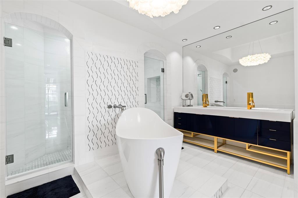 701 Southeast 21st Avenue, Unit 109 Deerfield Beach, FL 33441 - Photo 11 of 34 a bathroom with a sink and a mirror