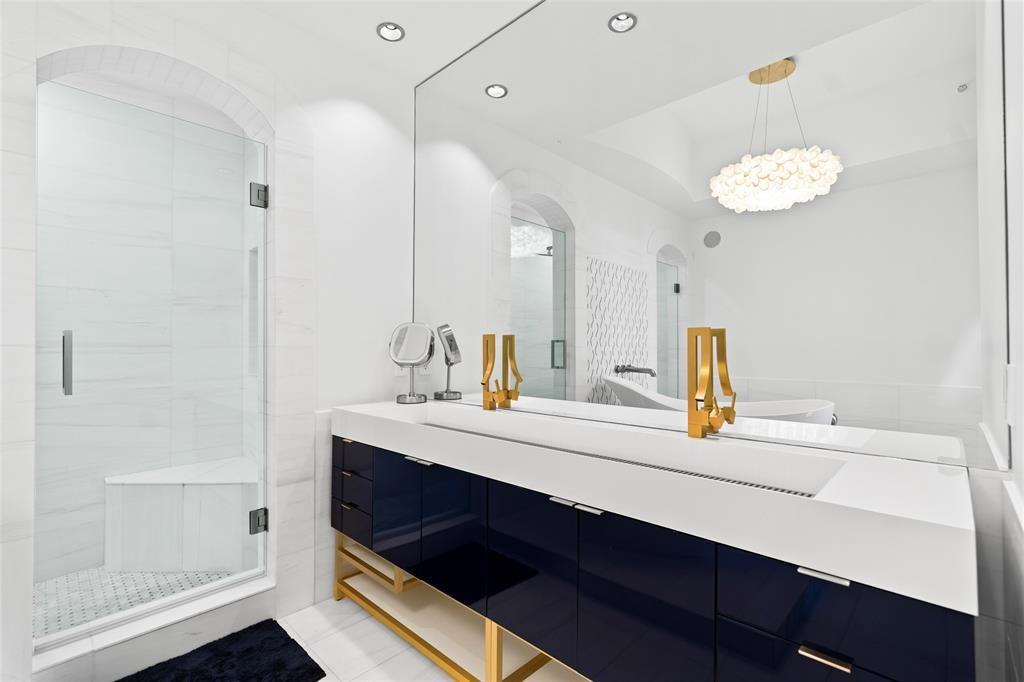 701 Southeast 21st Avenue, Unit 109 Deerfield Beach, FL 33441 - Photo 12 of 34 a bathroom with a sink and a mirror