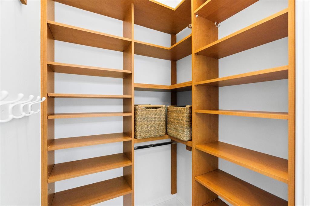 701 Southeast 21st Avenue, Unit 109 Deerfield Beach, FL 33441 - Photo 14 of 34 a view of walk in closet with empty racks