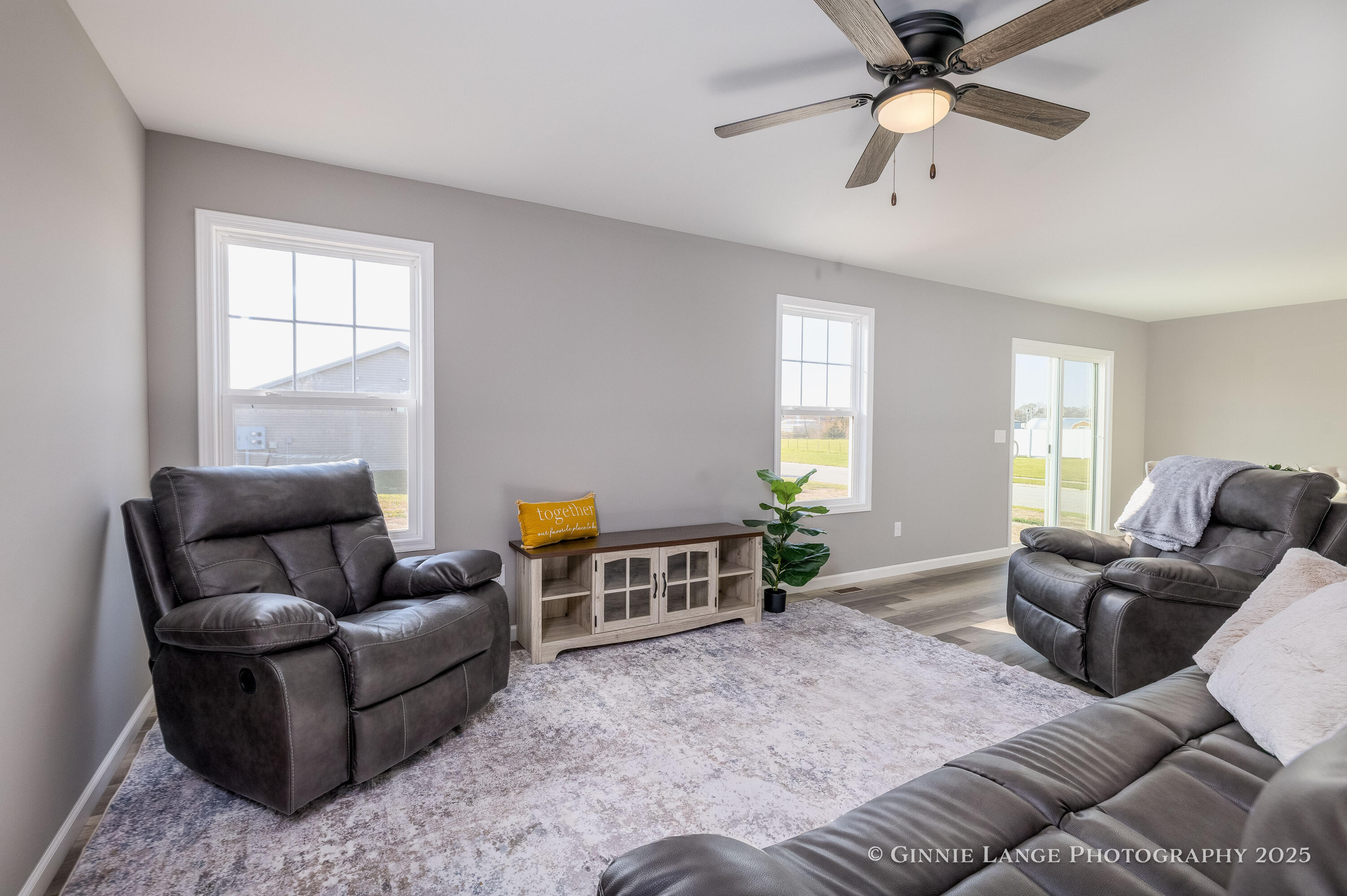 403 Wolf Street Rensselaer, IN 47978 - Photo 13 of 38 a living room with furniture and a window
