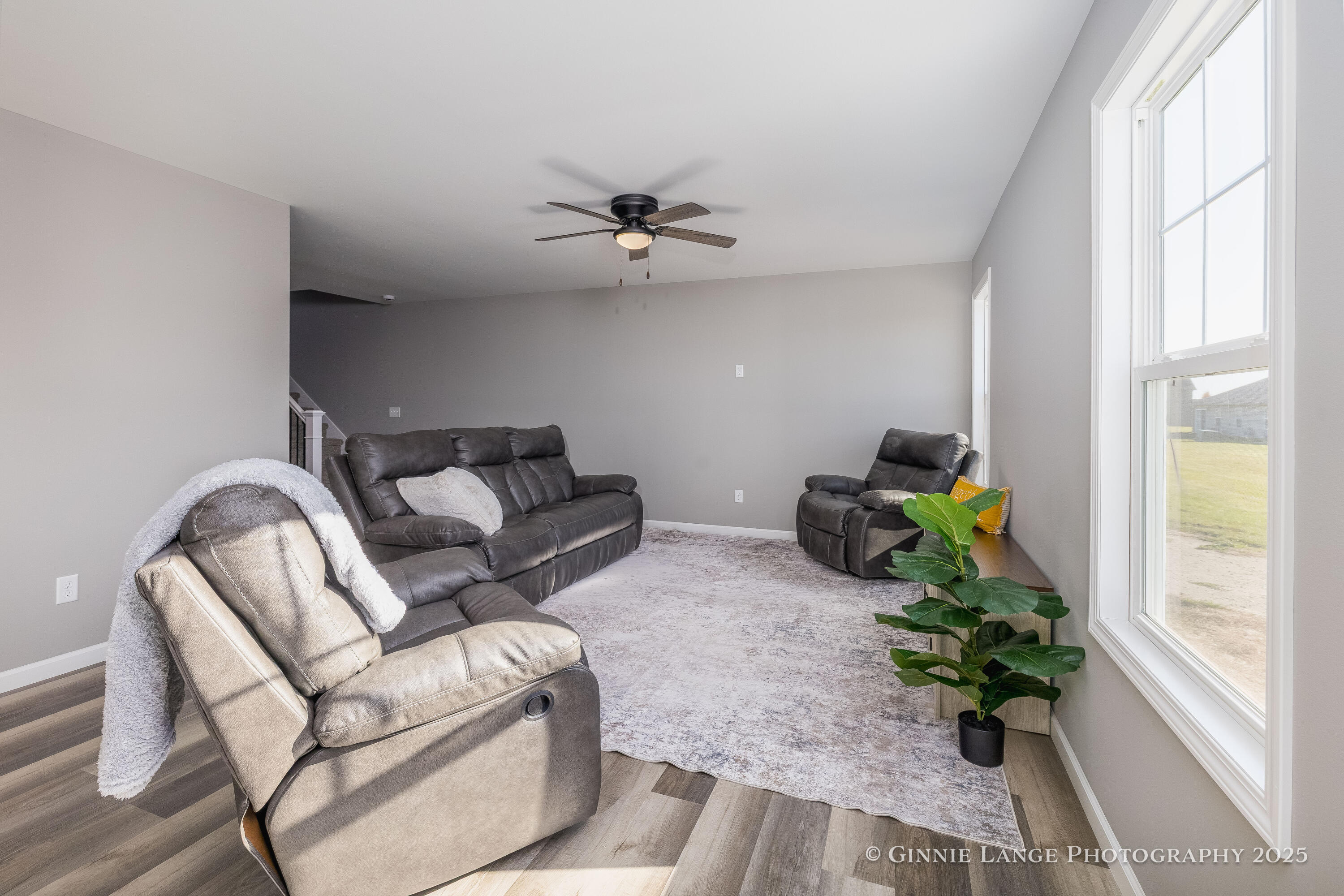 403 Wolf Street Rensselaer, IN 47978 - Photo 14 of 38 a living room with furniture flowerpot and a chandelier