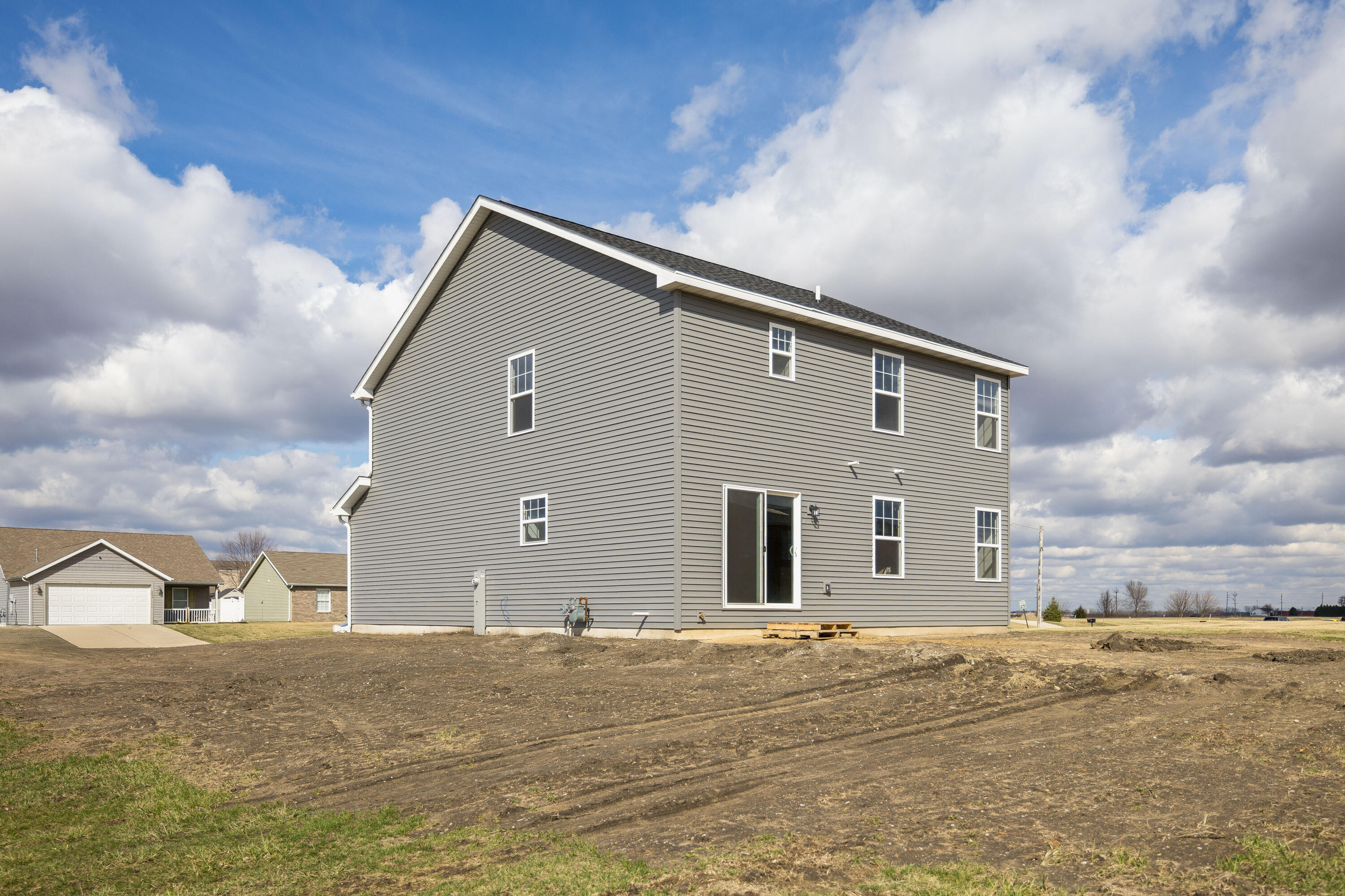 403 Wolf Street Rensselaer, IN 47978 - Photo 2 of 38 a view of a house with a yard