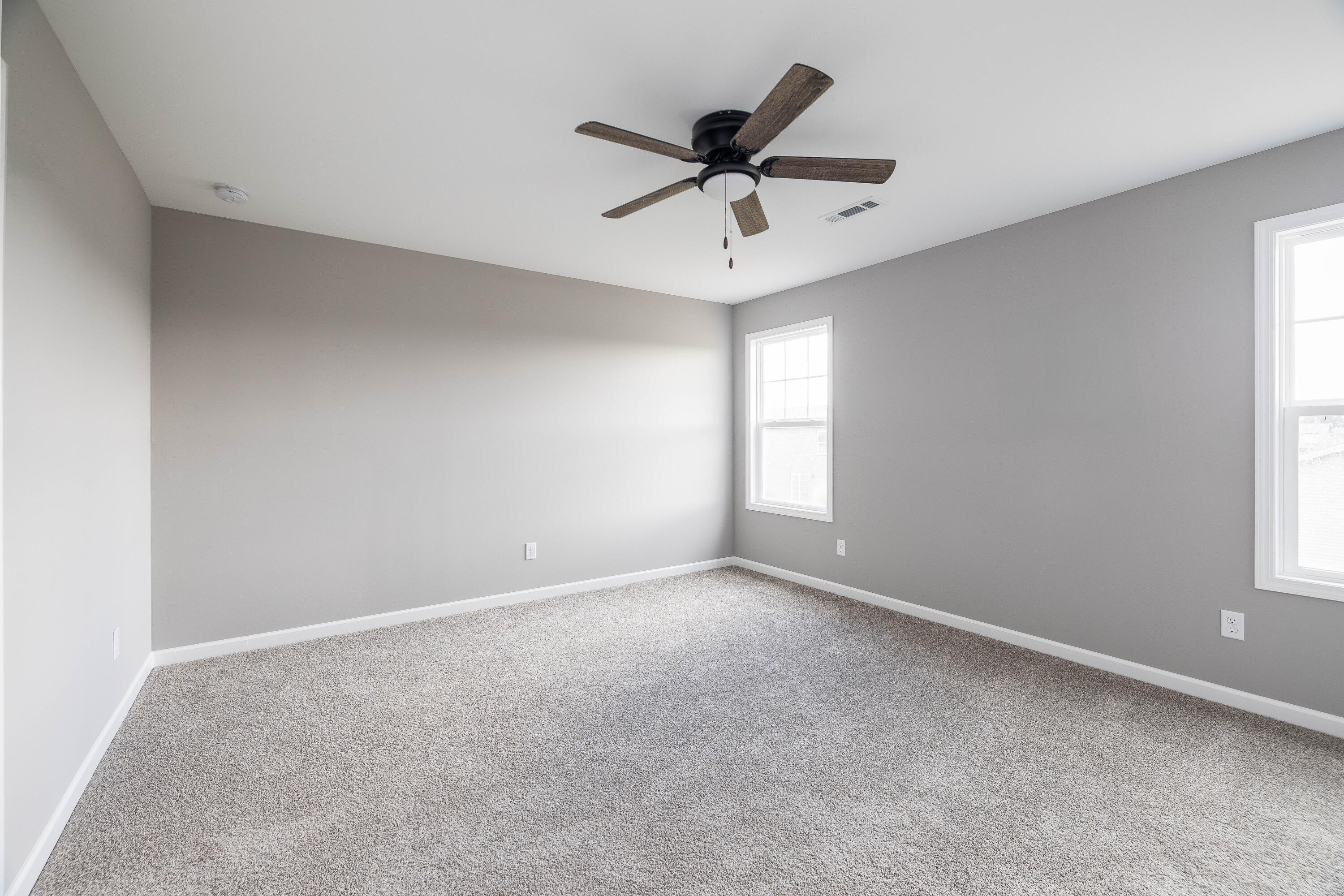 403 Wolf Street Rensselaer, IN 47978 - Photo 24 of 38 a view of a livingroom with a ceiling fan and window