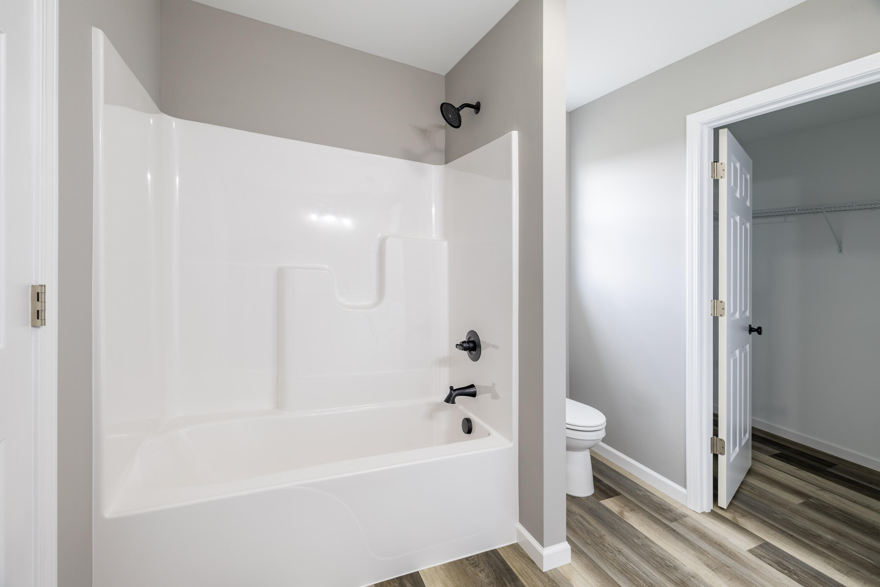 403 Wolf Street Rensselaer, IN 47978 - Photo 27 of 38 a bathroom with a bathtub a toilet and a shower