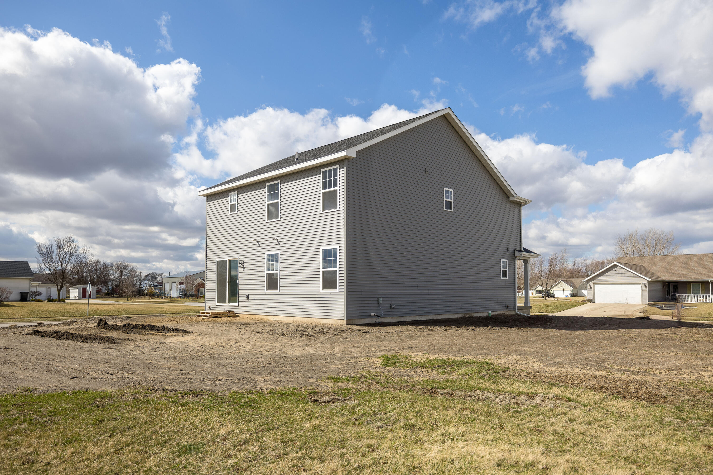 403 Wolf Street Rensselaer, IN 47978 - Photo 3 of 38 a view of a house with a yard